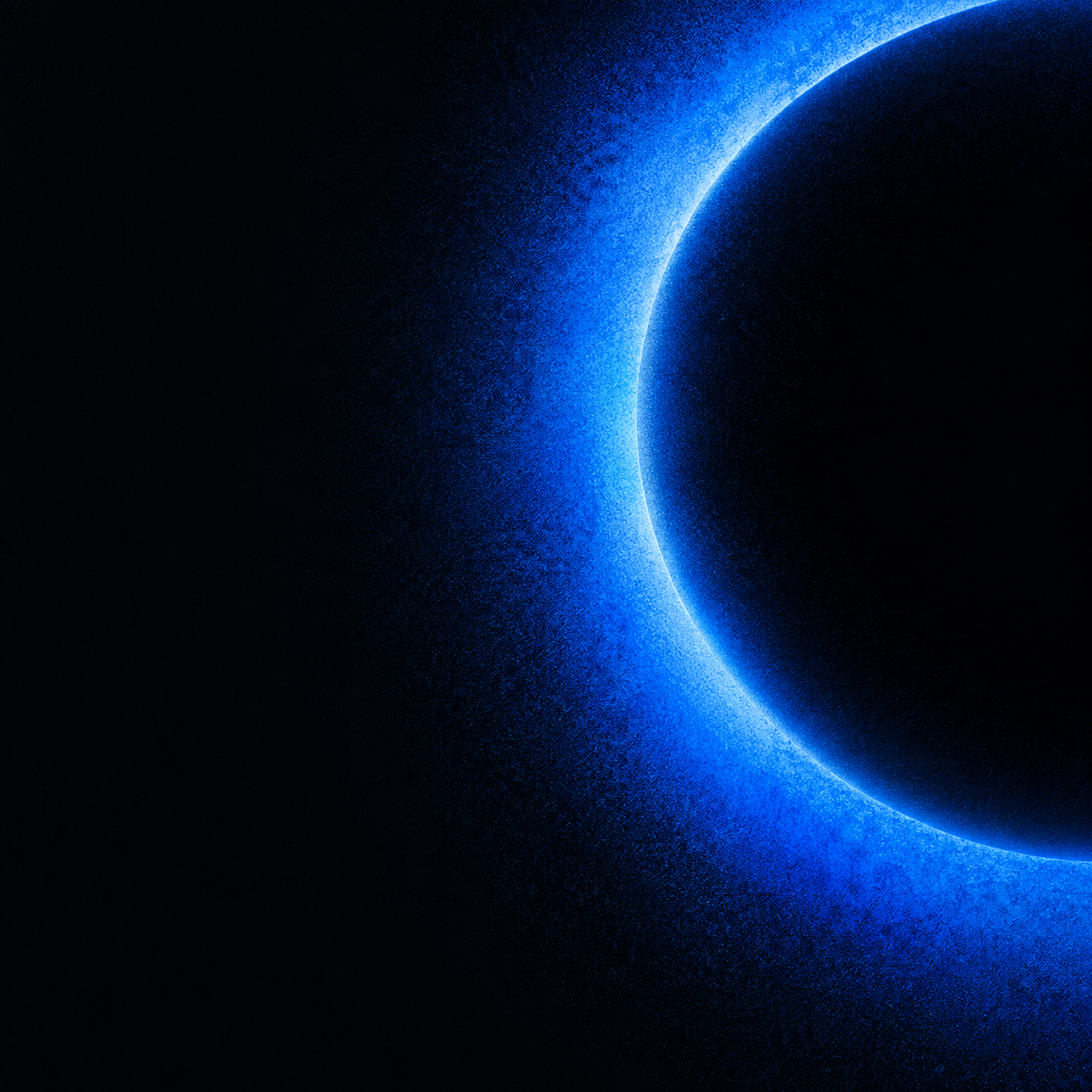 A grainy cobalt ring cropped against a black square canvas.