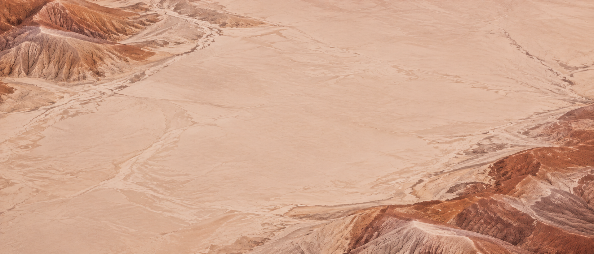 Sculpted desert lines and warm terracotta earth. Closing CTA background.